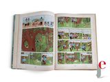 an open book with a picture of people in the pages