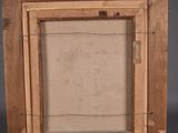 an old wooden easel with a painting on top of it