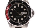 an image of a wrist watch with a black dial and a red second hand
