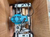a picture of a drill in a wooden box