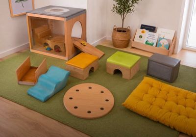 a room that has various toys on the floor