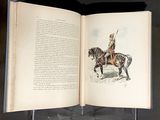an open book with a drawing of a man on a horse