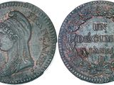 a close up of a coin with a woman ' s face on it