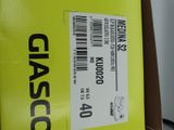 a yellow box with a black and white label on it