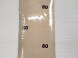 a brown bag with numbers on it sitting on a table