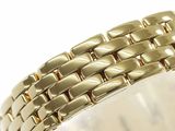 an image of a close up of a gold bracelet on a white surface