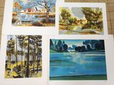 four paintings of different landscapes are displayed on a tile floor