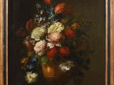peinture représentant des fleurs dans un vase doré sur fond noir