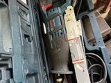 a tool in a case that is sitting on the floor
