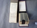 two open books that are sitting on a table