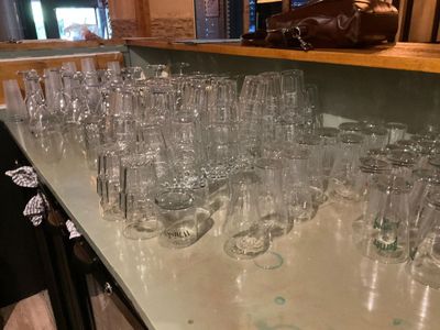 many glasses on the table ready to be filled with wine