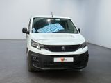 a white van that is parked in a room