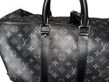 louis vuitton black monogram canvas and leather travel bag