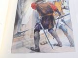 une image représentant un livre sur lequel figure l'image d'un homme tenant deux épées