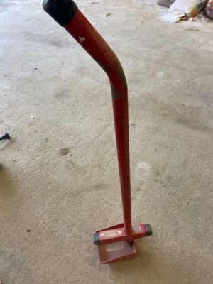 a close up of a baseball bat that is on the ground