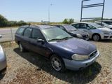 many cars that are parked in a parking lot