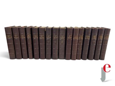 a group of books sitting on top of each other on a white surface