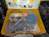 a yellow box with a bunch of tools inside of it