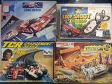 several toy cars are lined up on a table in a display case