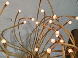 a light that is hanging from the top of a light fixture