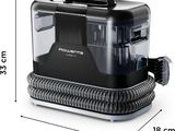 une image représentant une photo en noir et blanc d'un aspirateur