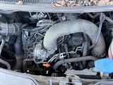 a picture of a car engine with its hood open