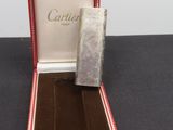 a box with a watch inside of it on a table