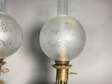 two lamps that are sitting on a table
