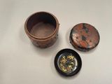 a small bowl and a small bowl sitting on a table