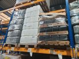 many boxes of toilet paper on the shelves in the warehouse