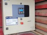 a control panel on the side of a building