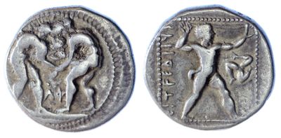 a silver coin with a man and a woman on it