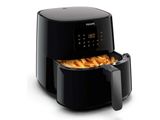gros plan d'une friteuse avec des frites dedans