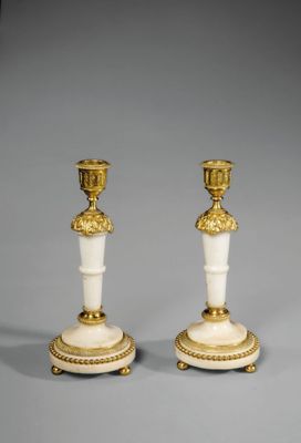 paire de bougeoirs anciens en laiton et marbre