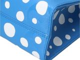 blue and white polka dot print purse with zipper closure