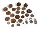 a lot of coins that are sitting on a table