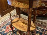 a table with a mirror on top of it in a room