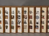 several books are stacked on top of each other on a table