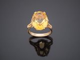 a yellow sapphire and diamond ring