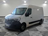 the white van is parked on a checkered floor in a room