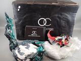 a box with a toy and some other items in it