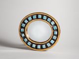 an image of a gold and blue ring