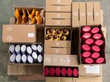 several boxes of assorted items are stacked on top of each other