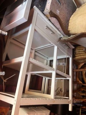 a ladder that is leaning against a wall in a room