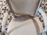 an image of a chair that is sitting on a rug