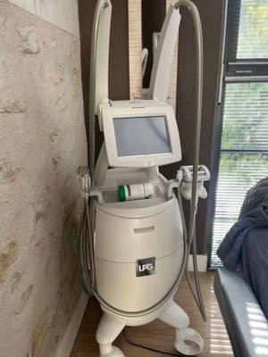 a machine that is sitting next to a window