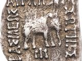 a close up of a silver coin with a horse on it
