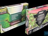 two boxes of pokemon trading cards are shown on a black background