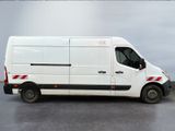 a white van that is parked on the side of the road
