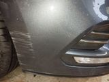 a close up of the front bumper of a car